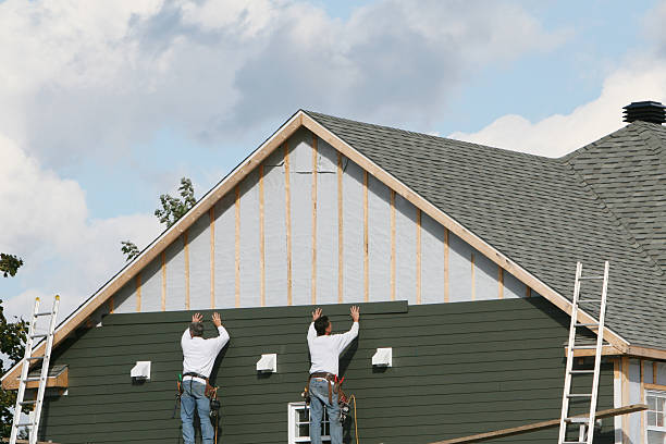 Professional Siding Contractor technician working in Centreville, MD